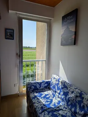 Un ou plusieurs lits dans un hébergement de l'établissement A l'ombre du Mont Saint Michel - Bed & Breakfast, Chambres d'hôtes