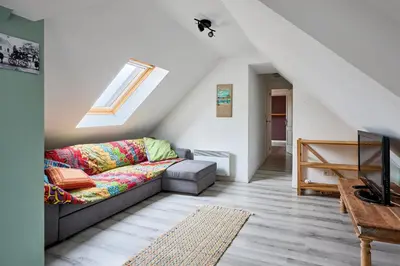Coin salon dans l'établissement Au Pré des Dunes - A 4 km de la plage