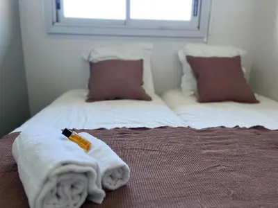 Un ou plusieurs lits dans un hébergement de l'établissement Appartement T2 vue mer