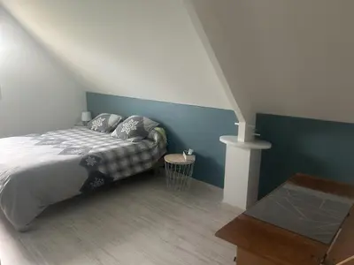 Un ou plusieurs lits dans un hébergement de l'établissement Gîte de la Mancellière sur vire