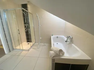 Salle de bains dans l'établissement Le Moulin