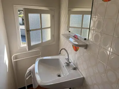Salle de bains dans l'établissement Le Moulin