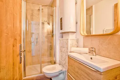 Salle de bains dans l'établissement Le Nid - Hypercentre - Vue sur le Château
