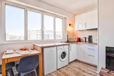 Cuisine ou kitchenette dans l'établissement Le Nid - Hypercentre - Vue sur le Château