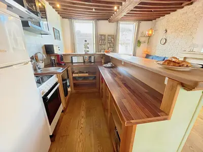 Cuisine ou kitchenette dans l'établissement A 10 minutes à pied de la gare et des Rives de l'Orne