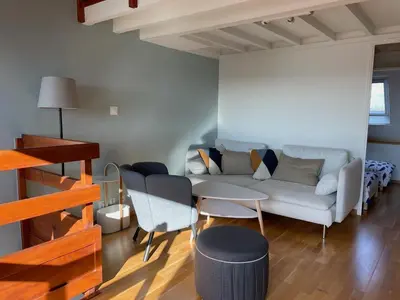 Coin salon dans l'établissement Appartement Ô Nid Perché Vue mer