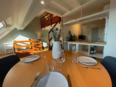 Coin salon dans l'établissement Appartement Ô Nid Perché Vue mer