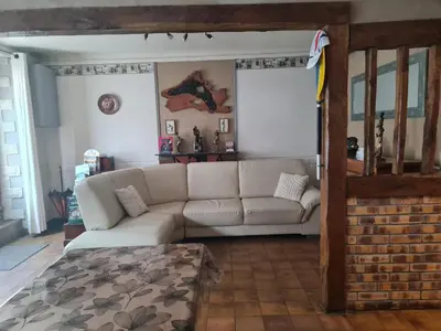 Coin salon dans l'établissement Gîte Ouillypontain