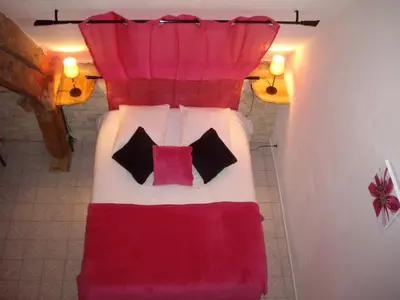 Un ou plusieurs lits dans un hébergement de l'établissement Auberge De La Luzerne