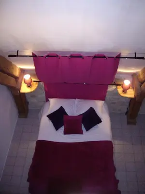 Un ou plusieurs lits dans un hébergement de l'établissement Auberge De La Luzerne