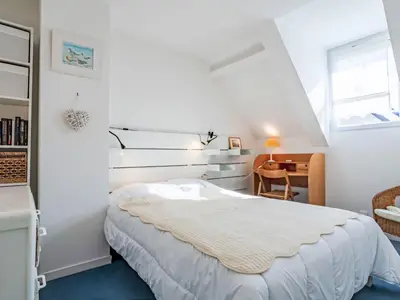 Un ou plusieurs lits dans un hébergement de l'établissement Holiday Home Les Goélands-29 by Interhome