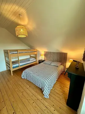 Un ou plusieurs lits dans un hébergement de l'établissement Maison de ville - 4-6 personnes - proche plage