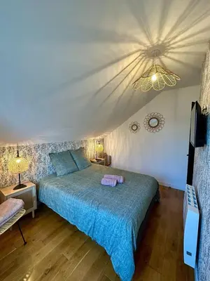 Un ou plusieurs lits dans un hébergement de l'établissement Maison de ville - 4-6 personnes - proche plage