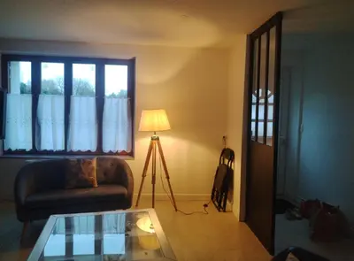 Coin salon dans l'établissement maison entre campagne et mer 10 personnes