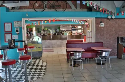 Restaurant ou autre lieu de restauration dans l'établissement Mobilhom 143