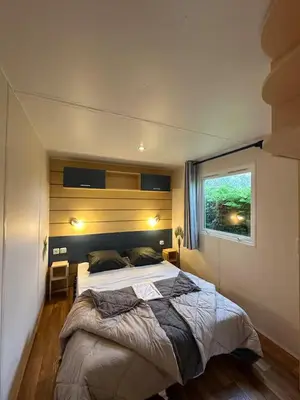 Un ou plusieurs lits dans un hébergement de l'établissement Mobil-home 5 personnes