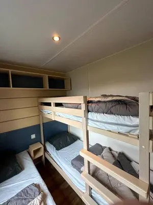 Un ou plusieurs lits dans un hébergement de l'établissement Mobil-home 5 personnes