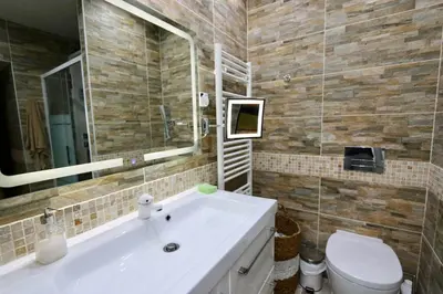Salle de bains dans l'établissement L'Escale des Rimains avec vue sur mer exceptionnelle