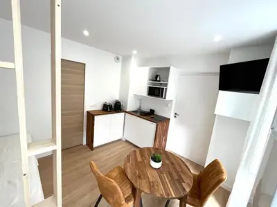 Cuisine ou kitchenette dans l'établissement Le Petit Saint-Martin - Hypercentre