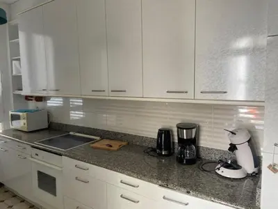 Cuisine ou kitchenette dans l'établissement Côté Port