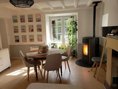 Coin salon dans l'établissement Maison de charme avec terrasse