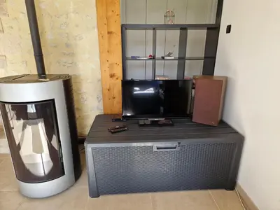 Télévision ou salle de divertissement dans l'établissement Gîte du moulin