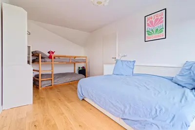 Un ou plusieurs lits dans un hébergement de l'établissement Lodge des Dunes - Proche de la plage