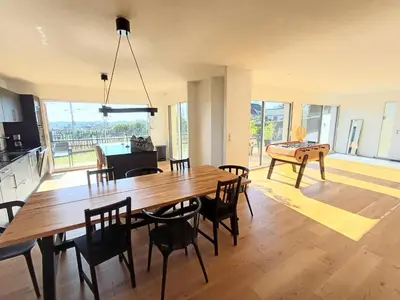 Télévision ou salle de divertissement dans l'établissement Lodge des Dunes - Proche de la plage