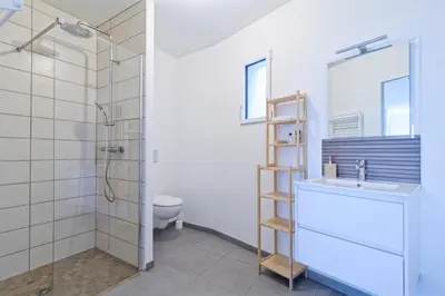 Salle de bains dans l'établissement Lodge des Dunes - Proche de la plage