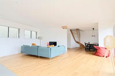 Télévision ou salle de divertissement dans l'établissement Lodge des Dunes - Proche de la plage
