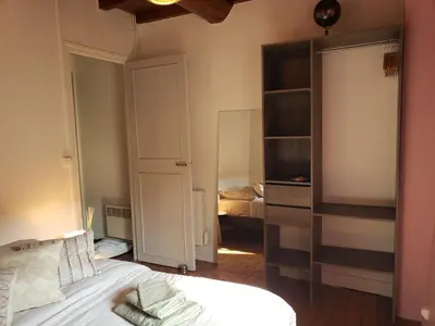 Un ou plusieurs lits dans un hébergement de l'établissement Maison de charme