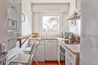 Cuisine ou kitchenette dans l'établissement Seafront flat near Cabourg with free private parking
