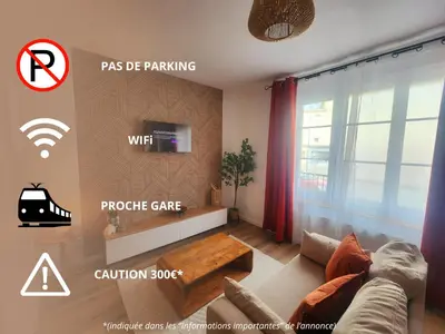 Télévision ou salle de divertissement dans l'établissement La Pause Plaisir - Studio à la Gare