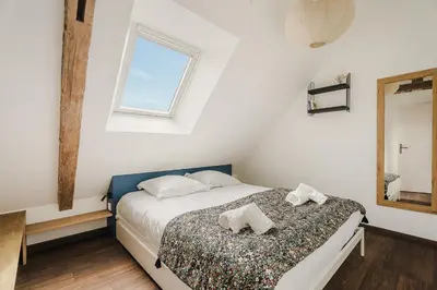 Un ou plusieurs lits dans un hébergement de l'établissement La Mer - Appartement calme et douillet à 5km du Mont St Miche - Wifi - Netflix