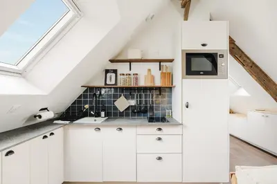Cuisine ou kitchenette dans l'établissement La Mer - Appartement calme et douillet à 5km du Mont St Miche - Wifi - Netflix