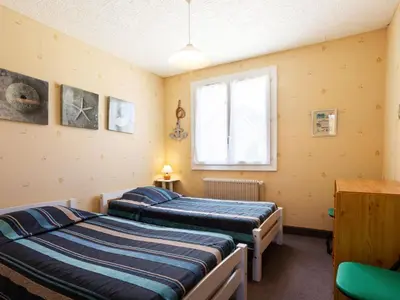 Un ou plusieurs lits dans un hébergement de l'établissement Holiday Home Le Pré Salé by Interhome