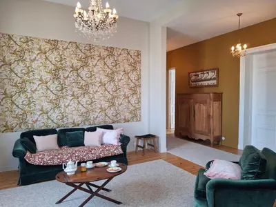Coin salon dans l'établissement Séjour chic en Art Déco