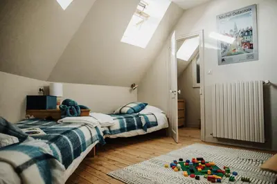 Un ou plusieurs lits dans un hébergement de l'établissement Gîte Le Mora