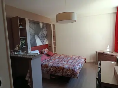 Un ou plusieurs lits dans un hébergement de l'établissement studio au pied de l'Orne