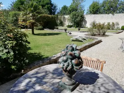 Jardin de l'établissement Victoria Arromanches B&B