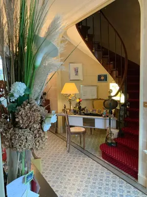 Coin salon dans l'établissement Victoria Arromanches B&B