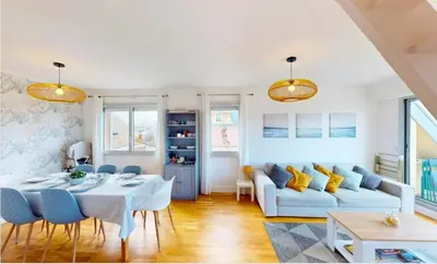 Coin salon dans l'établissement Superbe duplex familial Parking Plage à pied