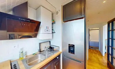 Cuisine ou kitchenette dans l'établissement Superbe duplex familial Parking Plage à pied