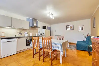 Cuisine ou kitchenette dans l'établissement Grand JUNO