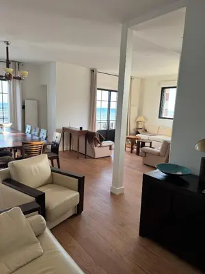 Coin salon dans l'établissement Maison d'exception face à la mer