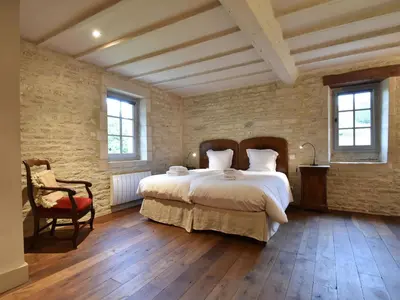 Un ou plusieurs lits dans un hébergement de l'établissement Elegant Normandy Retreat