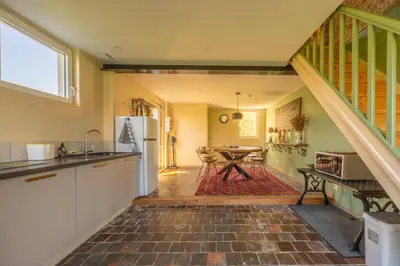 Cuisine ou kitchenette dans l'établissement Le Petit Pré terrasse & parking privé
