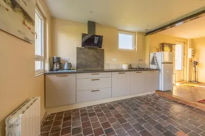 Cuisine ou kitchenette dans l'établissement Le Petit Pré terrasse & parking privé