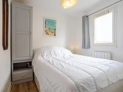 Un ou plusieurs lits dans un hébergement de l'établissement Apartment Front de Mer-9 by Interhome
