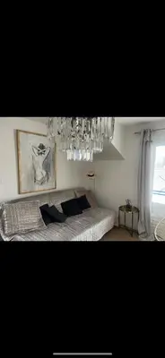 Un ou plusieurs lits dans un hébergement de l'établissement Appartement bord de mer